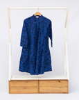 Display of black and blue floral dress.
