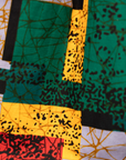 Close up display of multicolored geometric print skirt, fabric.