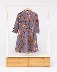 Display of black and white light bulb print dress.