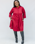 Model wearing burgundy linen dress.