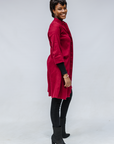 Model wearing burgundy linen dress.