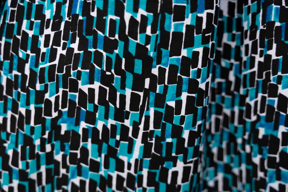 Close up display of black and white culottes, fabric.