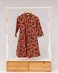 Display of butterfly print dress.
