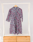 Display of purple and blue batik dress.