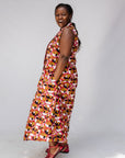 Model wearing geometric print dress.